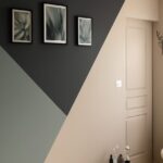 Modern geometric accent wall in neutral colors.